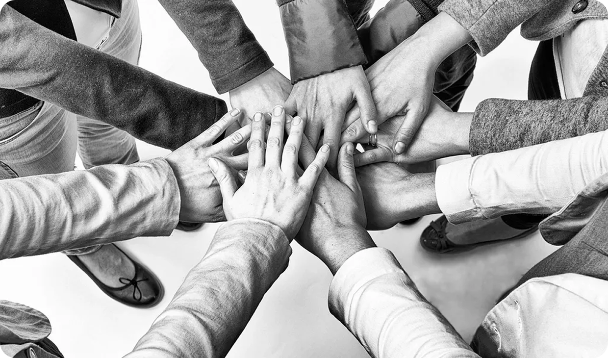 Group unity with hands together